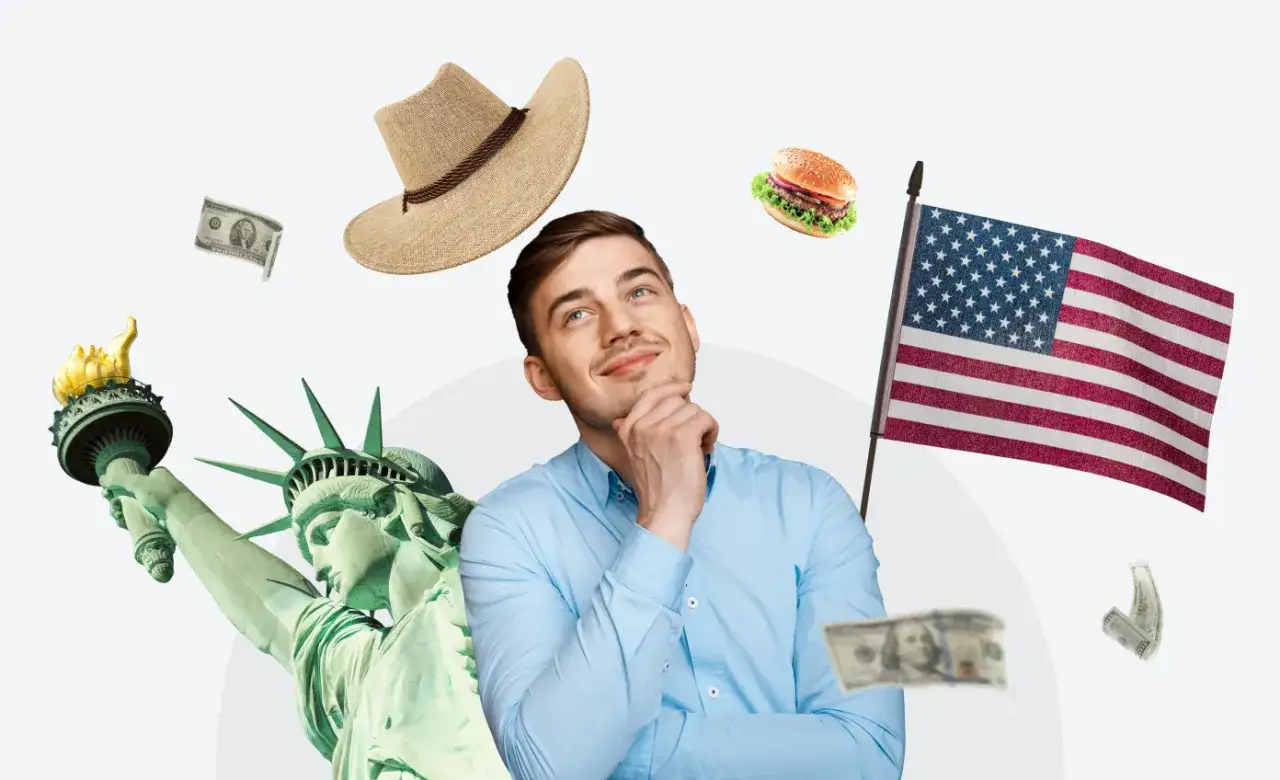 Młody mężczyzna marzy o USA, otoczony symbolami: Statua Wolności, amerykańska flaga, kapelusz, burger, dolary. Unikaj najczęstszych błędów dyskwalifikujących aplikantów w loterii wizowej o zieloną kartę.