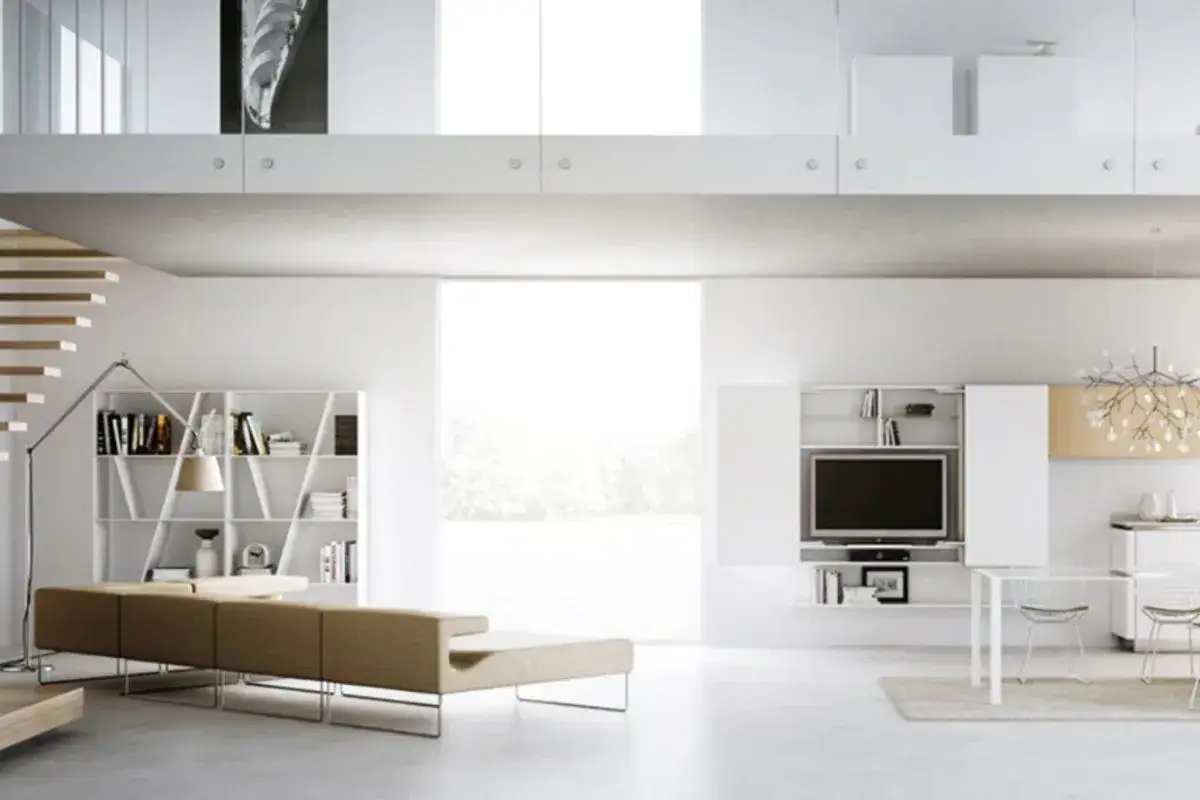 Soggiorno moderno con soppalco chiuso, divano componibile, libreria e zona TV. Idee per un soppalco chiuso funzionale.