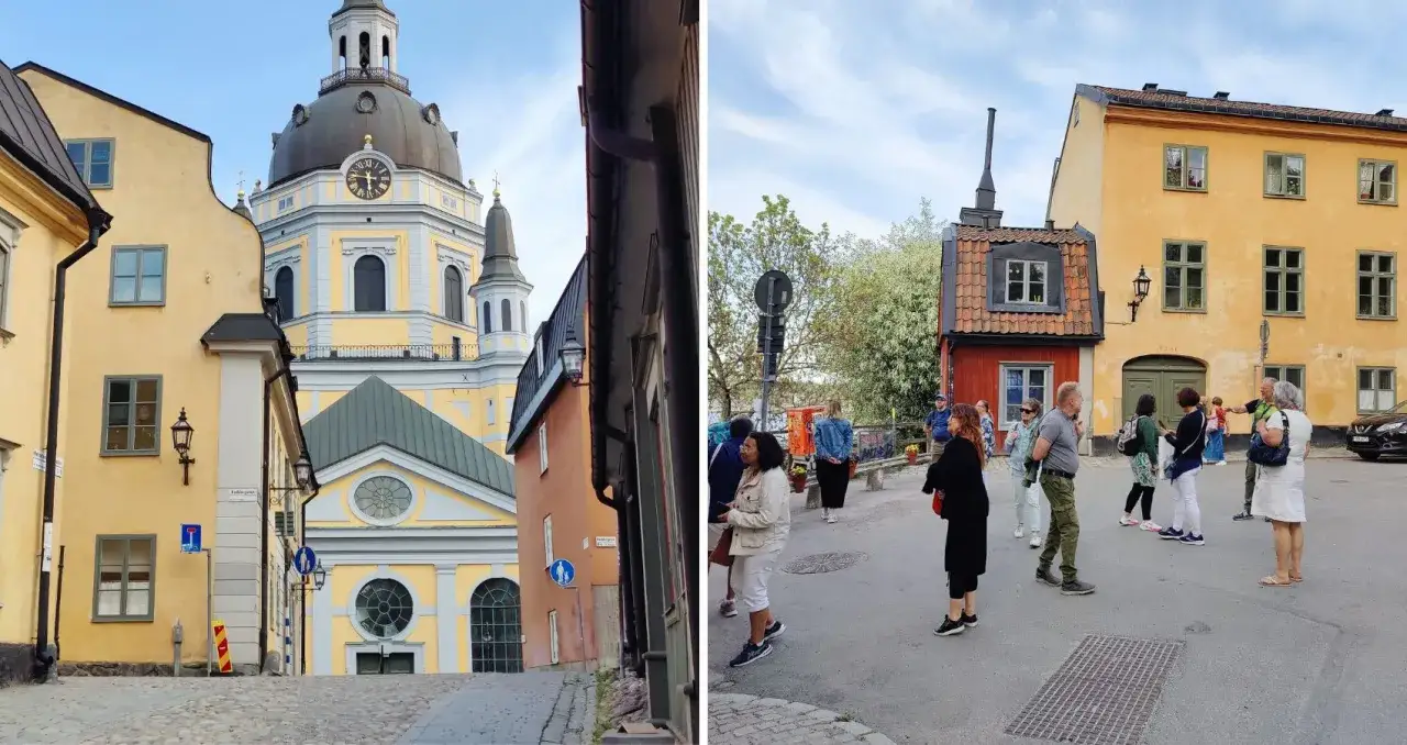 En grupp människor på en stadsvandring i Stockholm njuter av Gamla stans charmiga gränder och historiska byggnader.