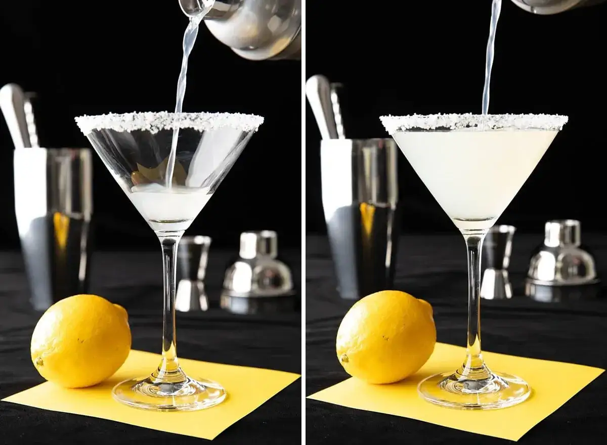 Przygotowanie martini z colą: nalewanie drinka do kieliszka z solonym brzegiem, obok cytryna i shaker.