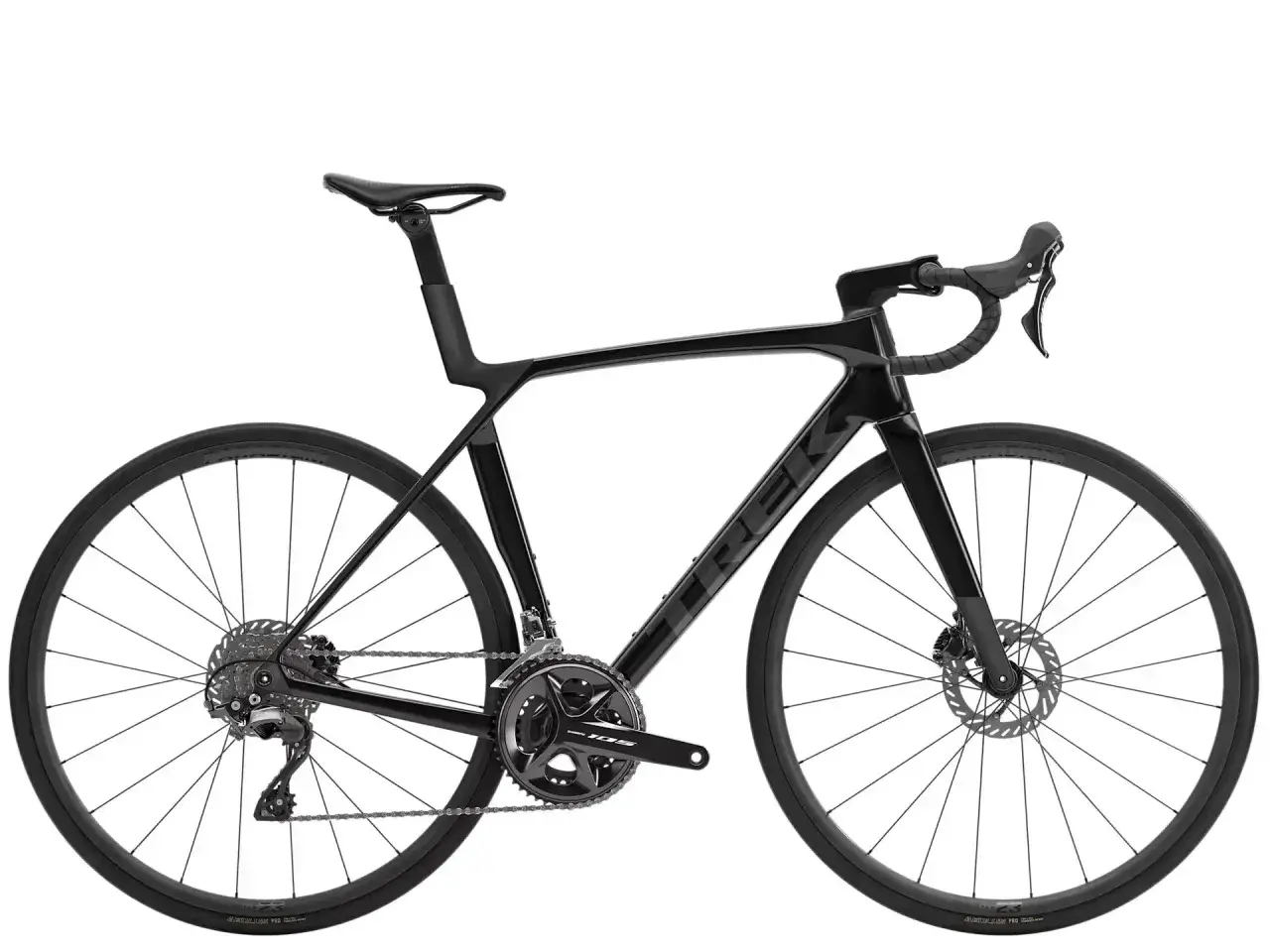 Schwarzes Trek Domane SL Comp Rennrad mit aerodynamischem Rahmen und Scheibenbremsen, bereit für dynamische Fahrten.
