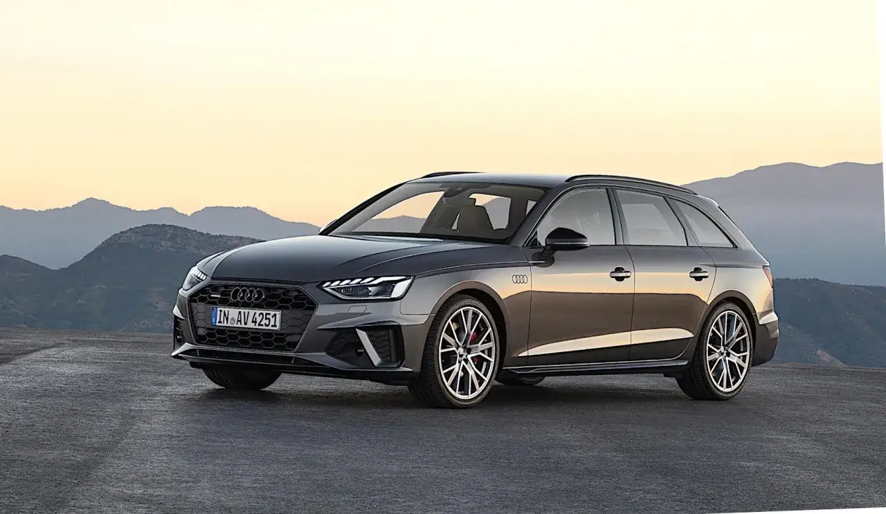 Szary Audi A4 Avant na tle gór. Sprawdź audi a4 wymiary, by poznać jego gabaryty.