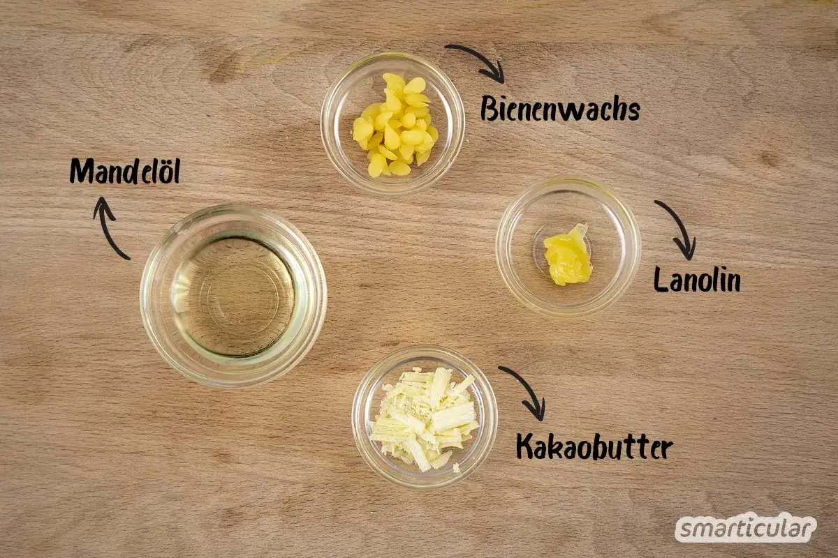 Zutaten f&uuml;r selbstgemachte Creme mit Sheabutter und Bienenwachs: Mandel&ouml;l, Kakaobutter, Lanolin und Bienenwachs.