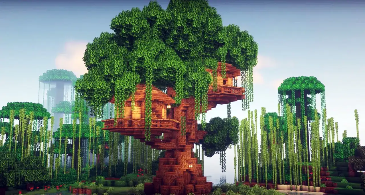 Wspaniała baza w dżungli, pokazująca, co można zbudować w MC: dom na drzewie wśród bambusów i bujnej roślinności.