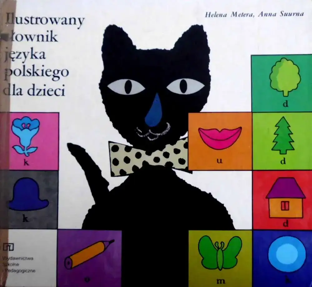 dziecko z zaciekawieniem oglądające ilustrowany słownik języka polskiego