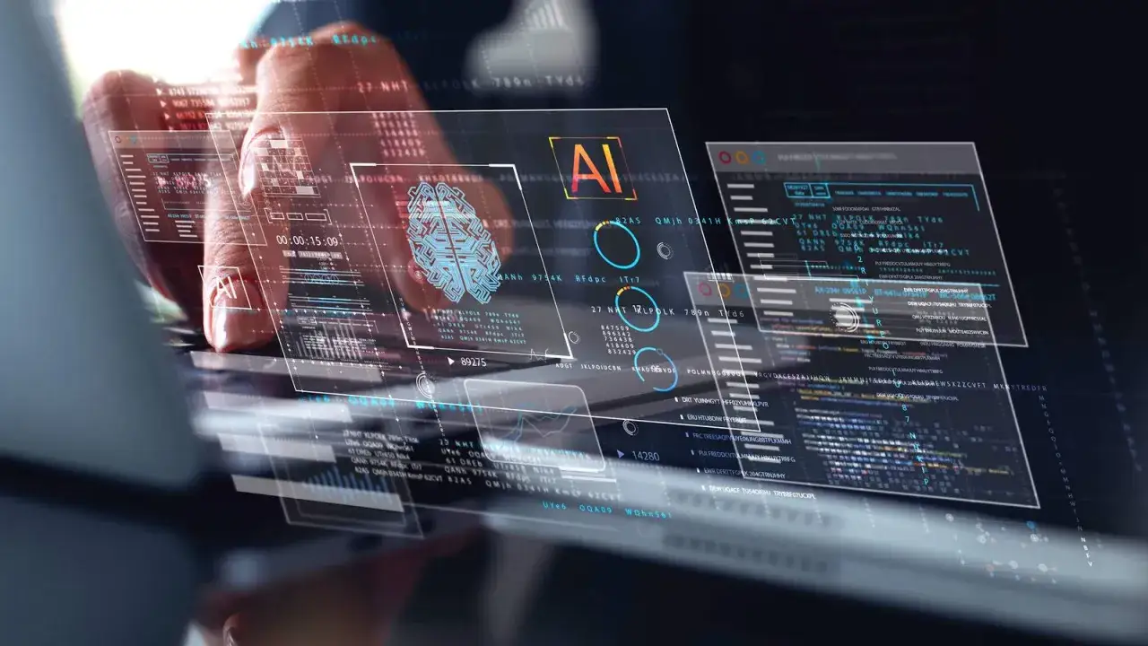Program sztuczna inteligencja analizuje dane na ekranie. Widoczny jest m&oacute;zg symbolizujący AI.