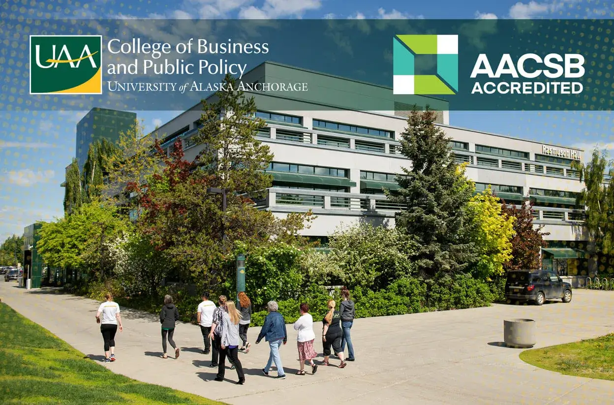 University of Alaska Anchorage's College of Business and Public Policy, AACSB accredited, with students walking outside Rasmuson Hall.