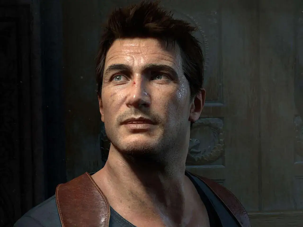 Nathan Drake z Uncharted 5, zamyślony, czeka na kolejną przygodę.