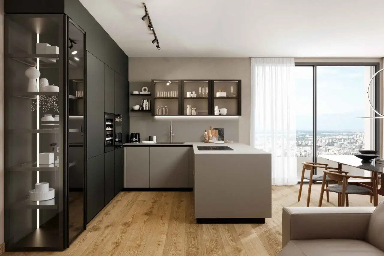 Cucina moderna con isola, pensili in vetro e armadio a colonna. Perfetta per chi cerca idee cucina eleganti e funzionali.