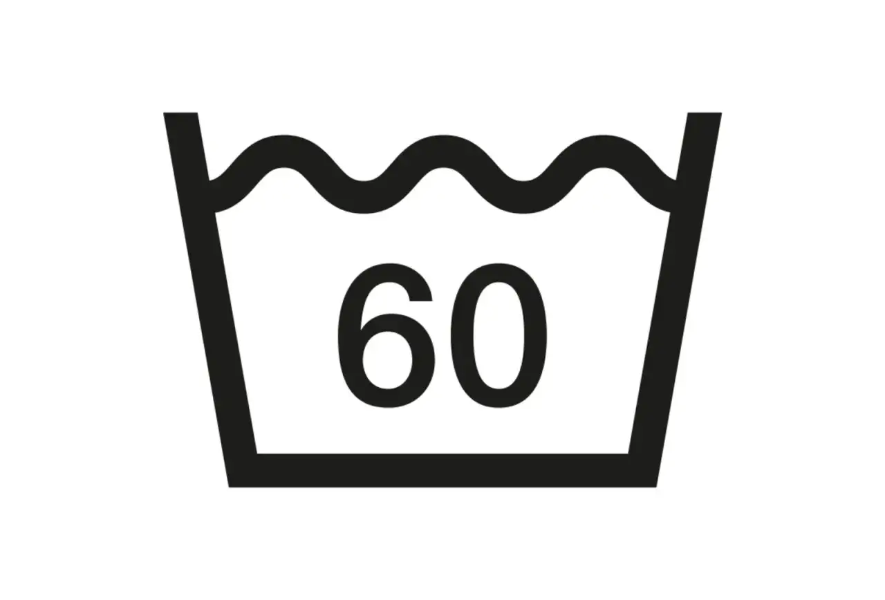Waschanleitung: Leinen bei 60 Grad waschen. Das Symbol zeigt eine Waschschüssel mit Wellen und der Zahl 60.