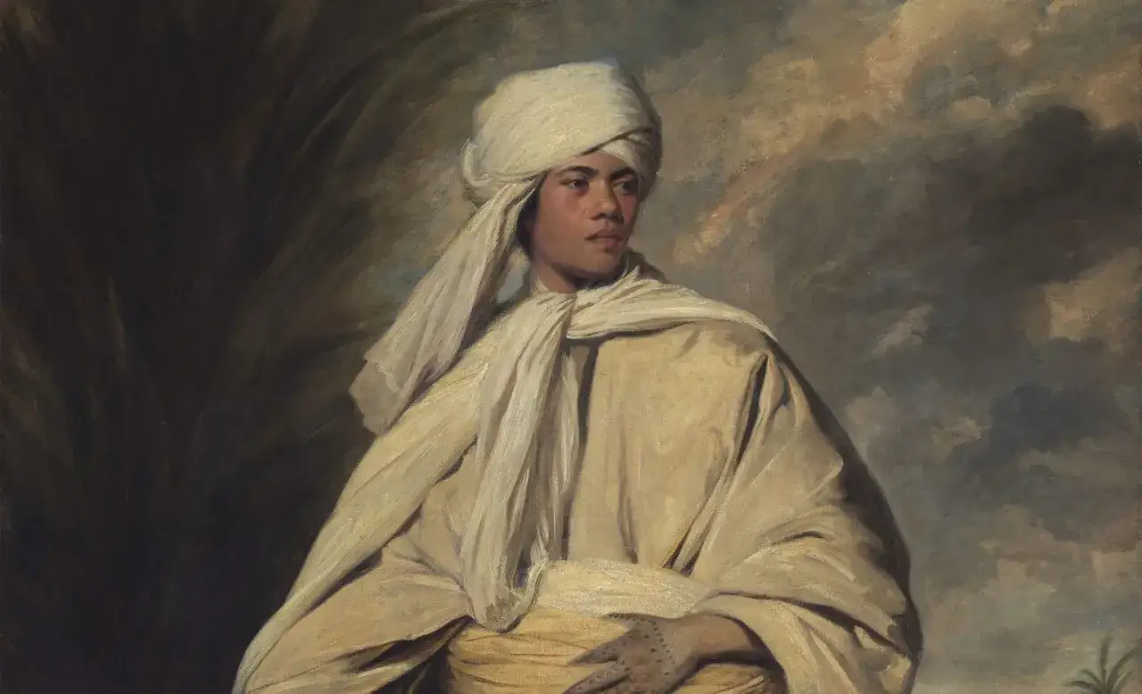 A striking portrait of Omai, a Polynesian man, wearing a white turban and flowing robes against a dramatic sky.
