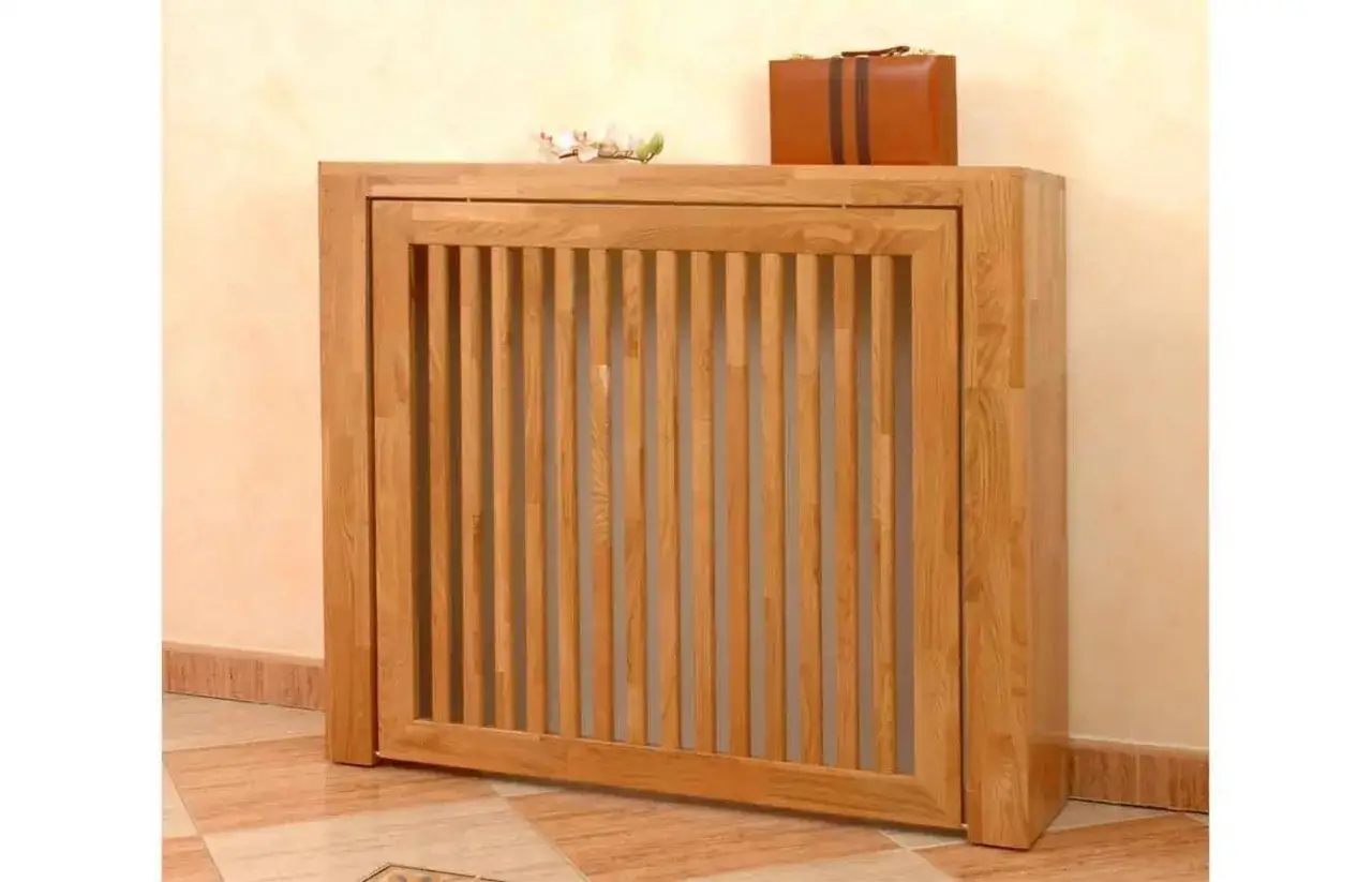 Elegante cubre radiador casero de madera, con diseño de lamas verticales. Un toque rústico y funcional para tu hogar.