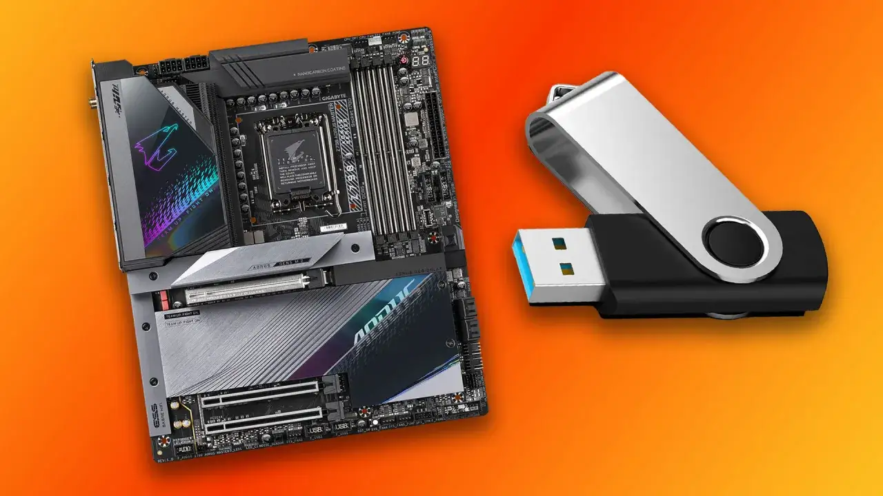 Carte mère AORUS et clé USB, prêts pour une mise à jour BIOS.
