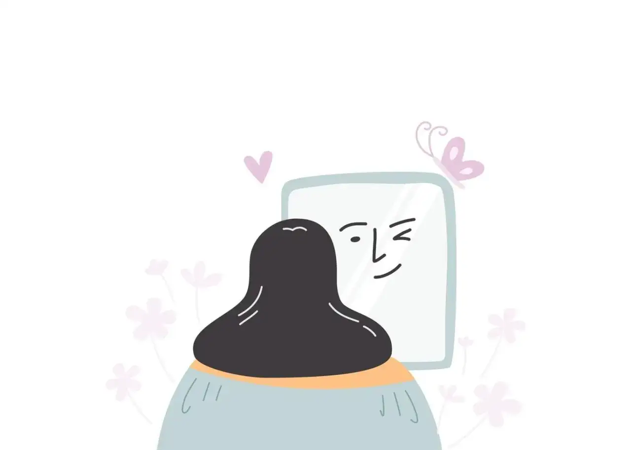 Uśmiechnięta twarz w lustrze, symbol pozytywnej afirmacji. Motyl i kwiaty dodają uroku.