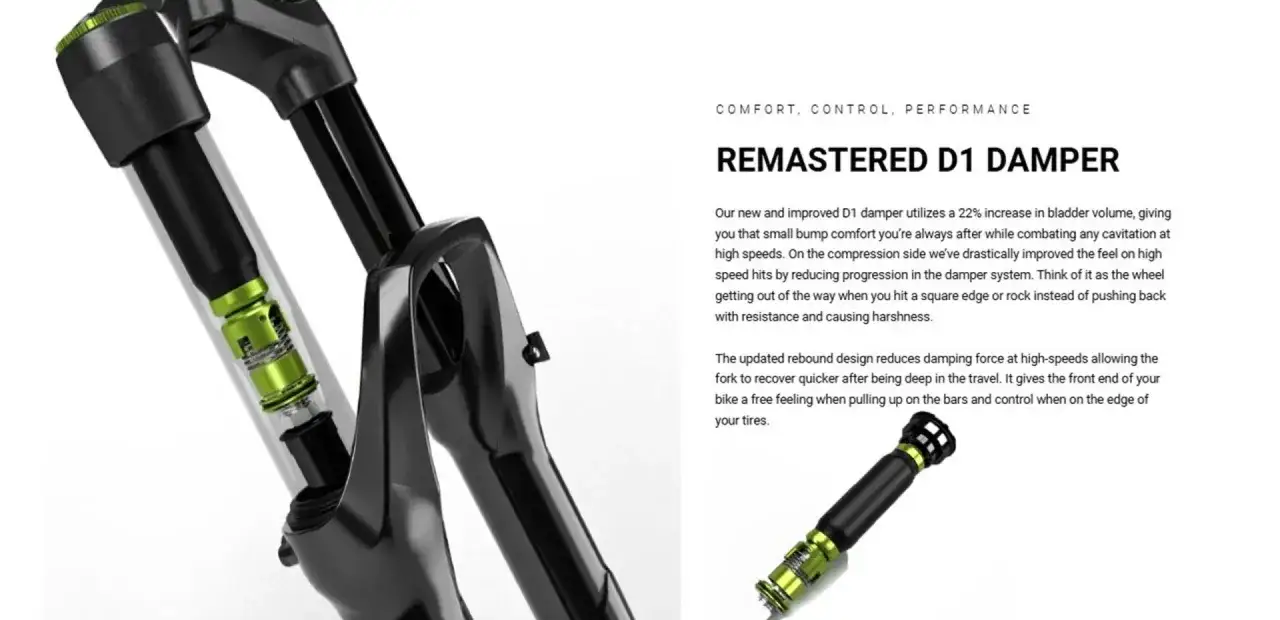Close-up of a bicycle fork showing the internal D1 damper with green accents. This remastered D1 damper offers improved comfort and control.