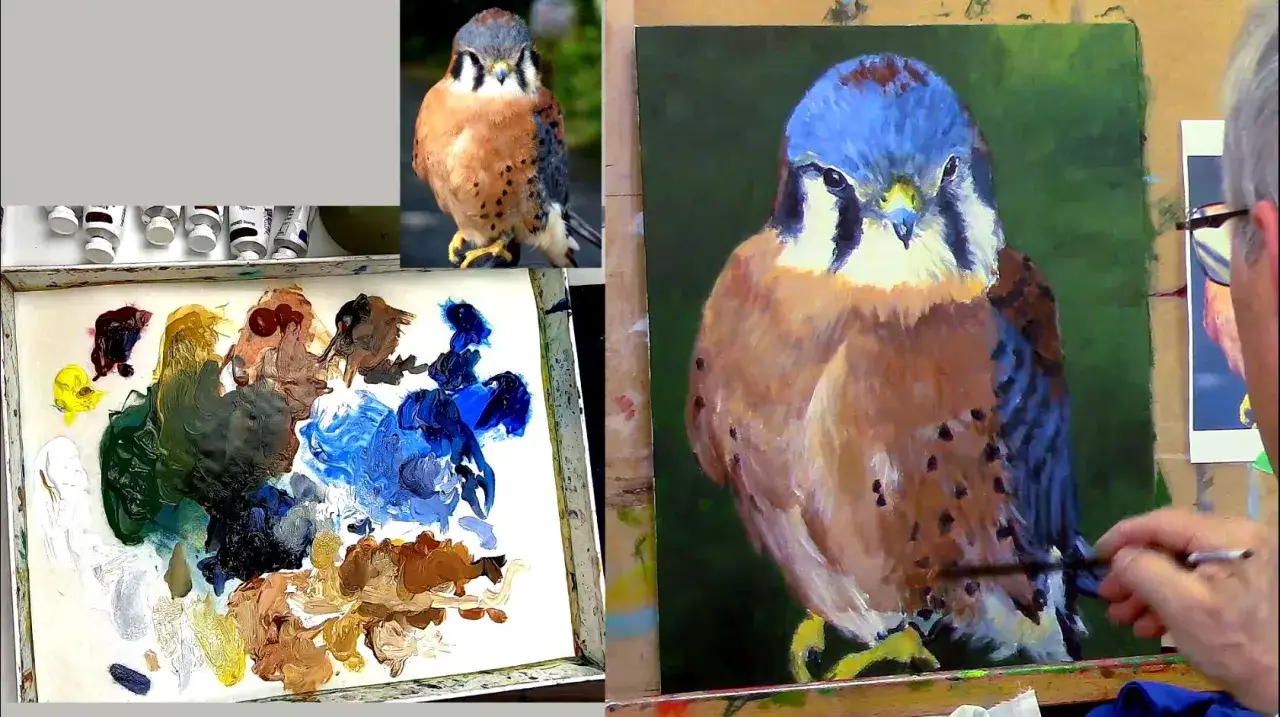 Un artiste peint un faucon crécerelle, un tableau peinture acrylique facile à faire. Palette de couleurs et tubes de peinture à proximité.