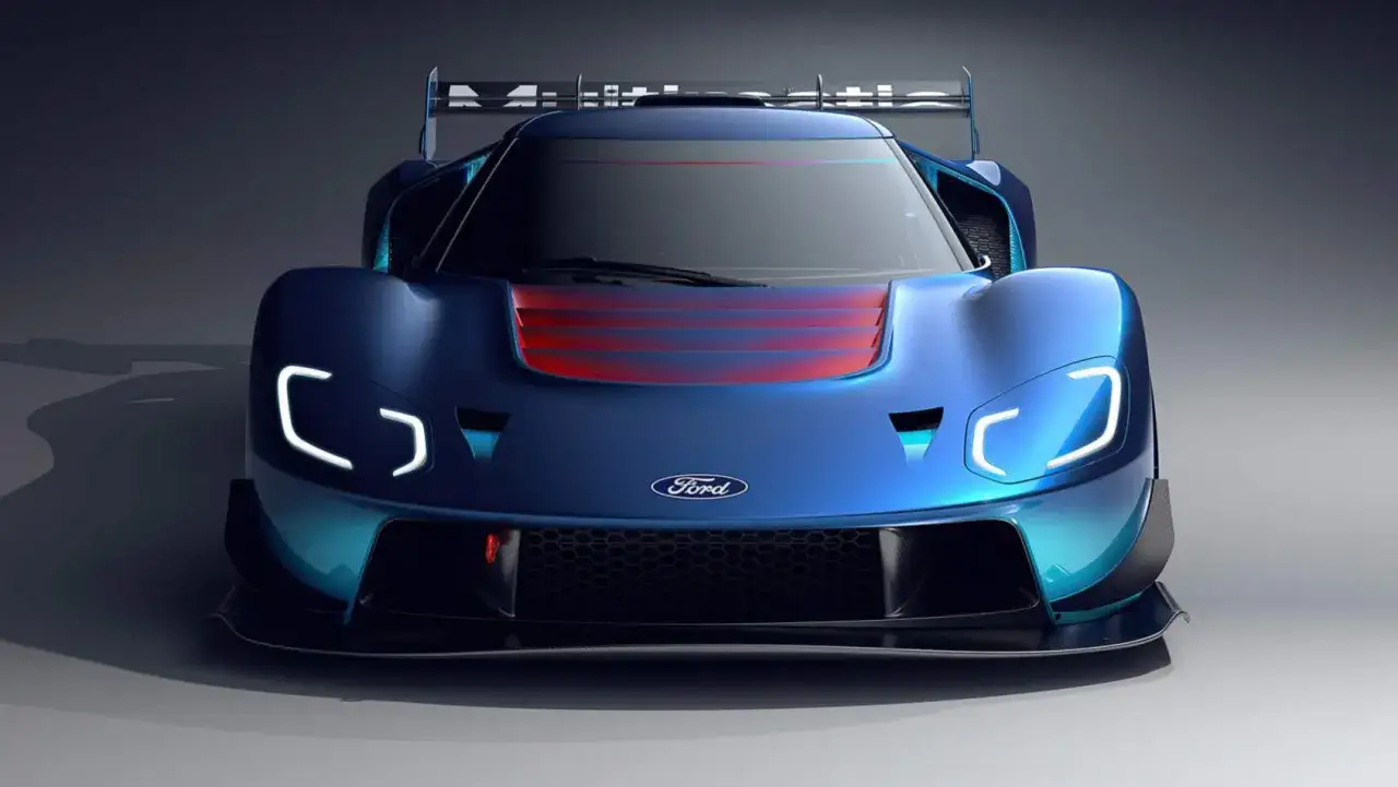 Niebieski Ford GT z czerwonymi pasami na masce i futurystycznymi światłami. Wygląda jak gotowy do wyścigu.