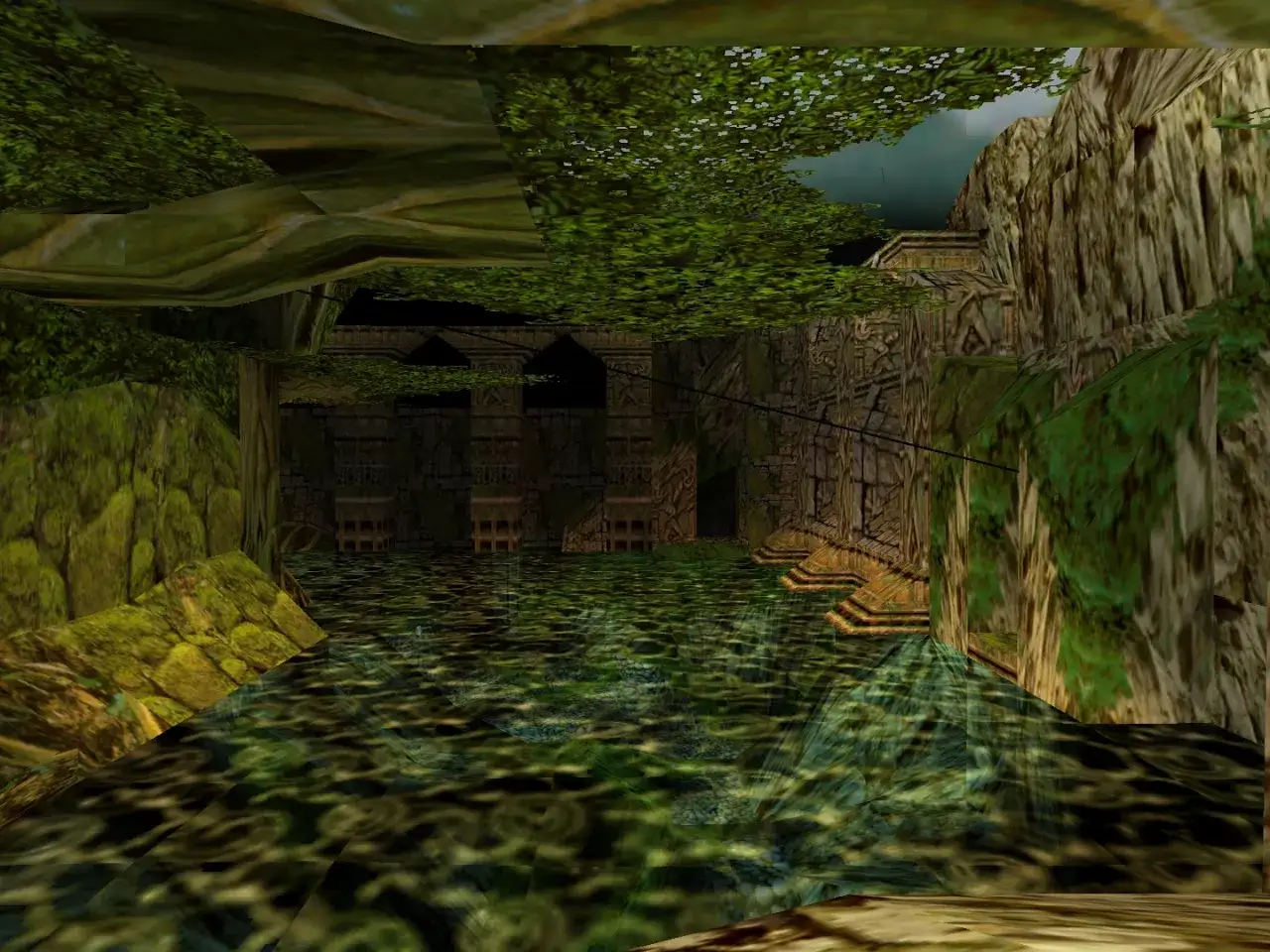 Zanurzona w zieleni, starożytna budowla z kamienia, zalaną wodą ścieżką, jak z gry Tomb Raider.