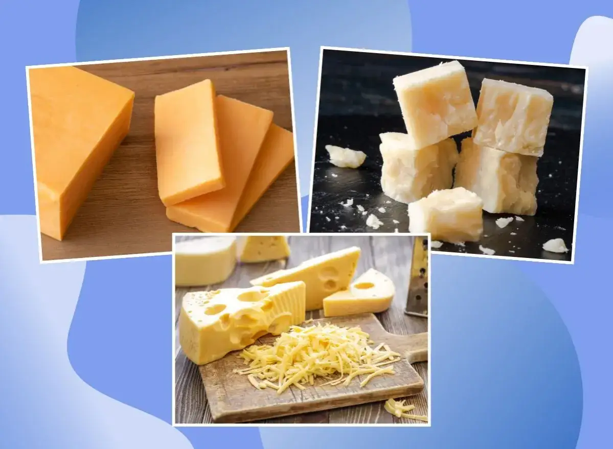 Pomarańczowe i ż&oacute;łte sery, w tym parmezan, na desce. Szukasz, jaki ser ma najmniej kalorii?