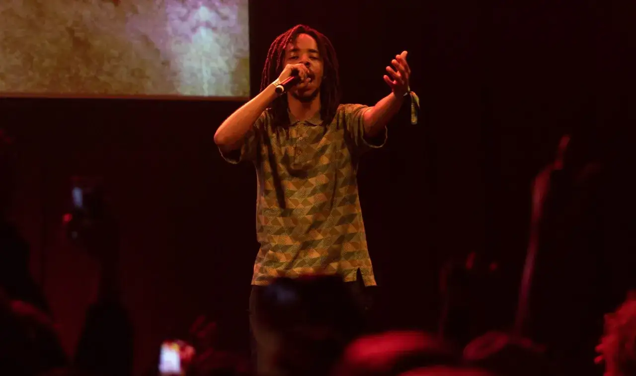 Earl Sweatshirt performs live, captivating the crowd with his unique flow. The audience eagerly awaits each track from his Earl Sweatshirt setlist.