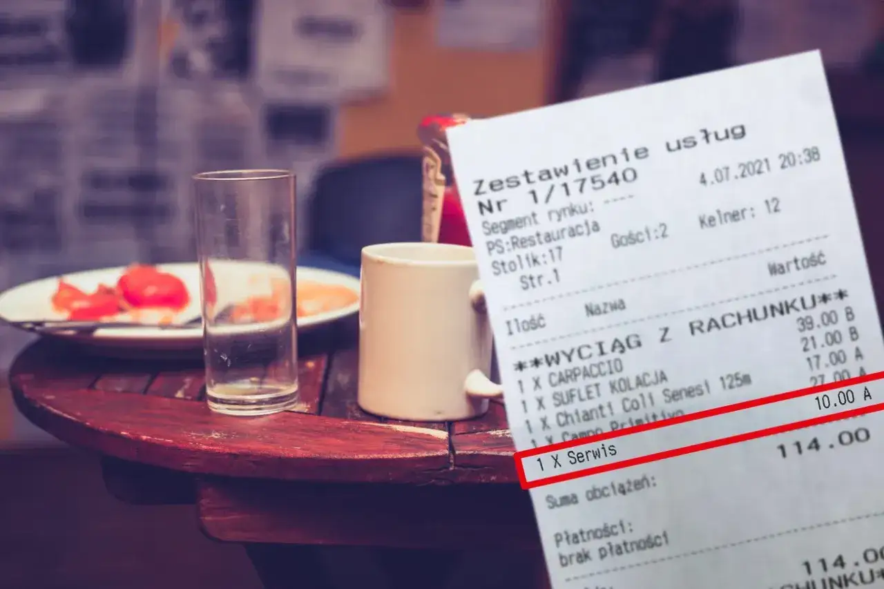 Na stole restauracyjnym leży rachunek po francusku z widocznym wpisem