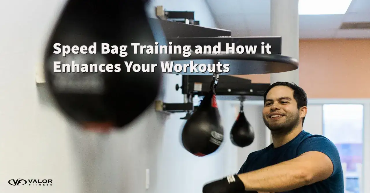 Man smiles while training with speed bags, highlighting the speed bag muscles worked and how it enhances workouts.