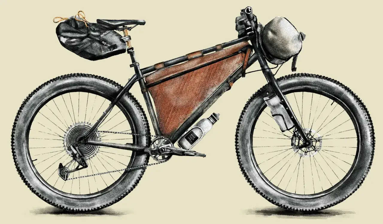 Rower g&oacute;rski z sakwami i torbą podsiodłową, gotowy na przygodę w stylu mtb bikepacking.