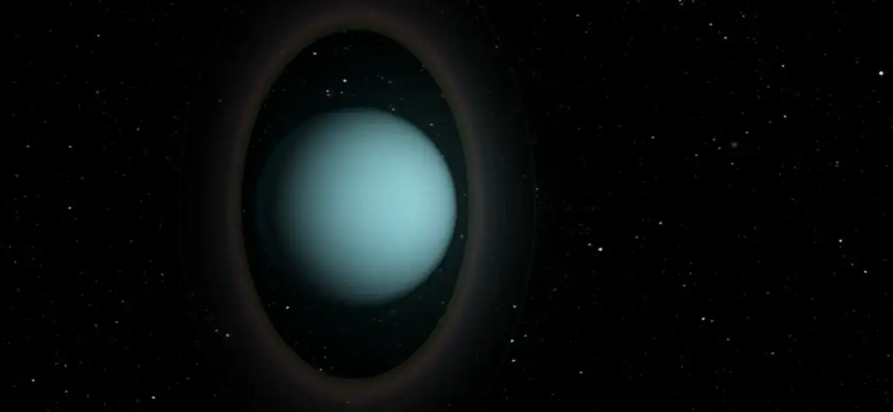 En bl&aring;gr&ouml;n planet, Uranus, omgiven av svaga, m&ouml;rka cirklar runt Uranus i rymden, med stj&auml;rnor i bakgrunden.