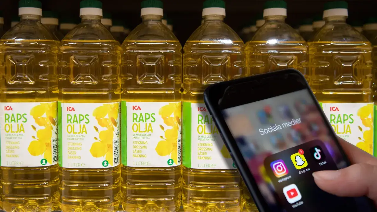 Rapsolja i flaskor på hylla, en mobil med sociala medier-appar visas. Varning för att rapsolja kan vara farligt om den hettas upp för mycket.