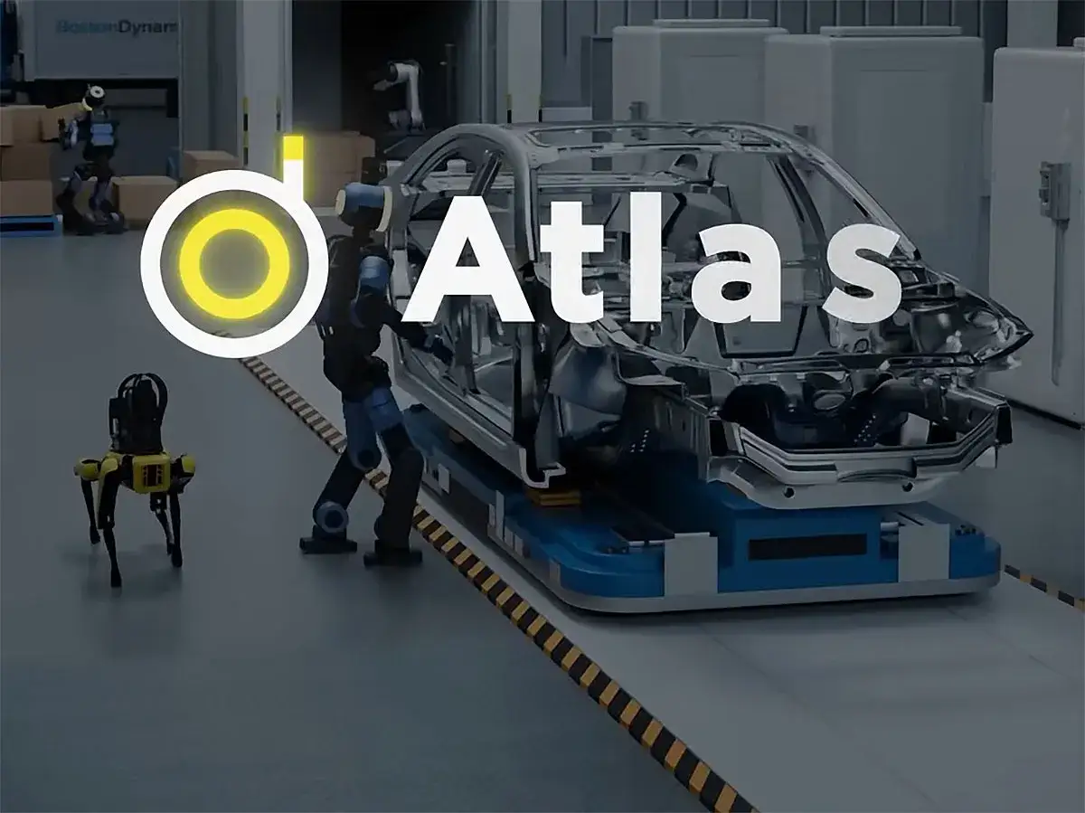 Roboty humanoidalne Atlas i Spot pracują przy montażu karoserii samochodu w fabryce.