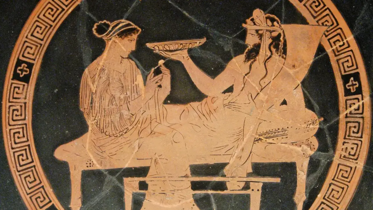 Sc&egrave;ne antique : Pers&eacute;phone, reine des Enfers, offre une coupe &agrave; Had&egrave;s. Le **pers&eacute;phone signification** est ici la dualit&eacute; vie/mort.