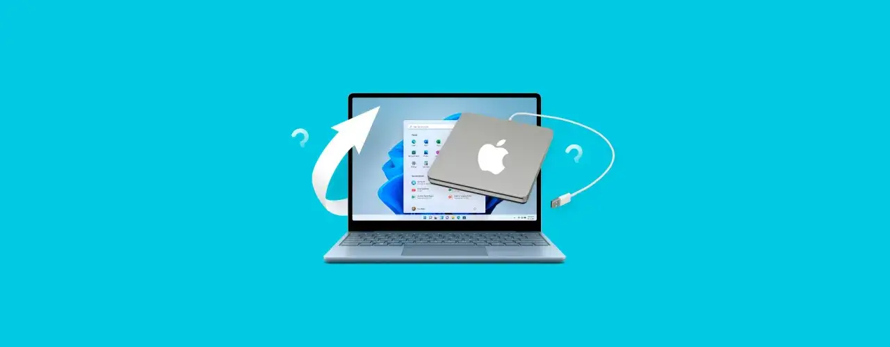 Jak zmienić hasło w komputerze? Laptop z systemem Windows i podłączony dysk Apple. Strzałka i znaki zapytania sugerują proces zmiany.