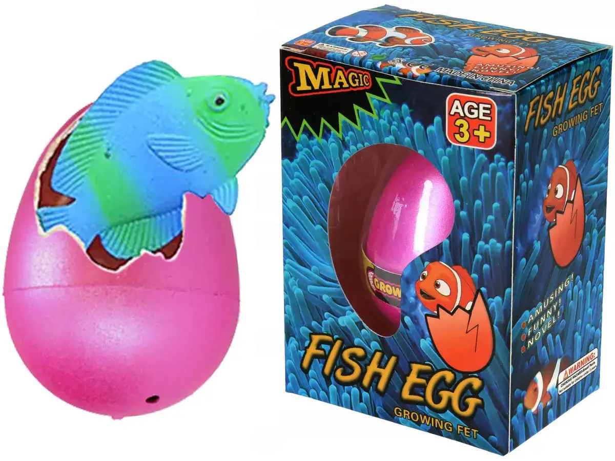 Różowe jajko z wykluwającą się rybką i pudełko zabawki "Fish Egg".