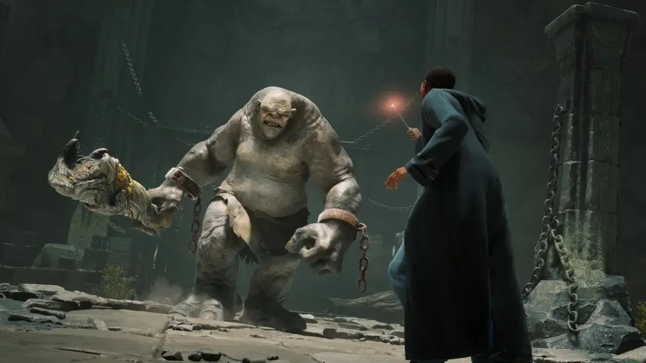 Student walczy z trollem w mrocznym lochu. Czy to przygoda z Hogwarts Legacy Game Pass?