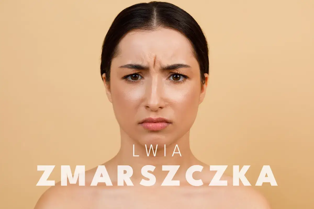 Kobieta z wyraźną lwia zmarszczka między brwiami, zamyślona.