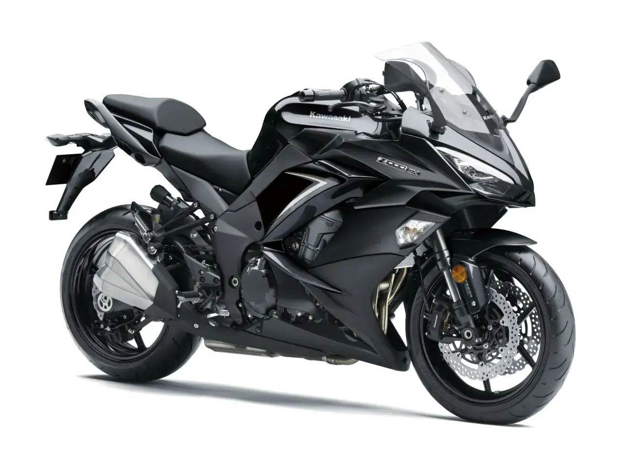 Czarny motocykl Kawasaki Z1000SX z matowym wykończeniem, sportową sylwetką i dużą szybą.