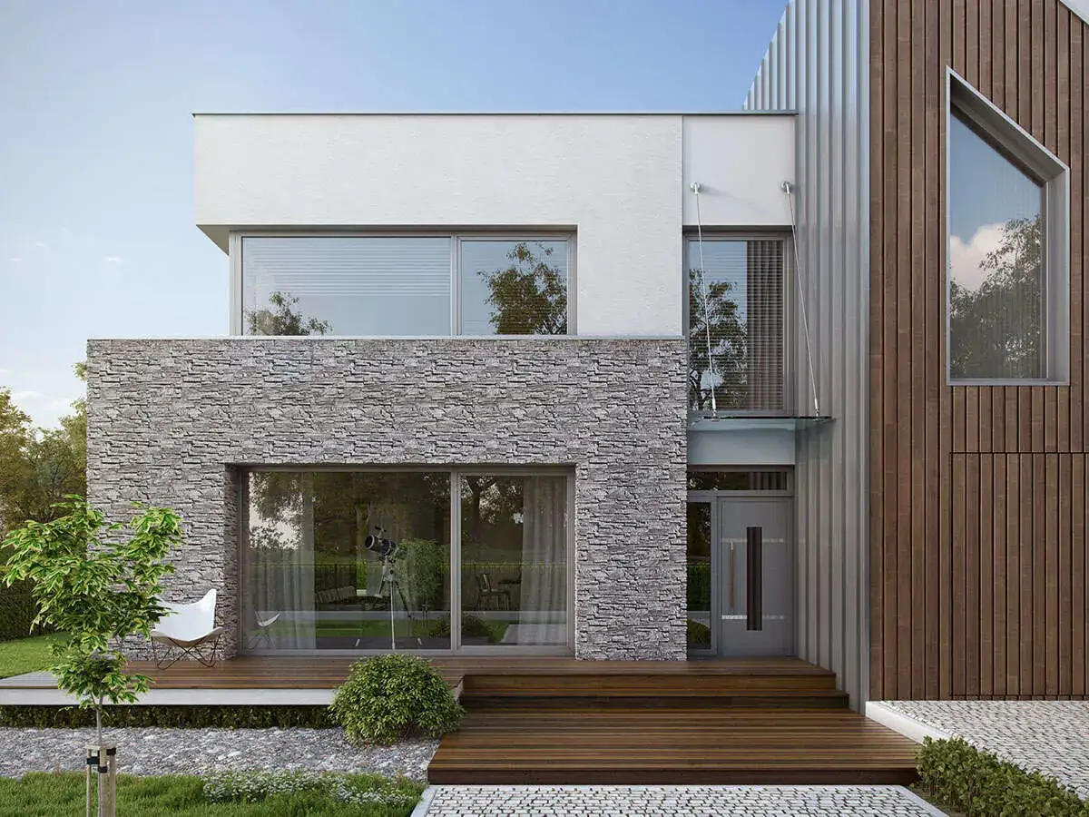Nowoczesny dom z kamienną okładziną i drewnianymi panelami. Świetna alternatywa co na elewację zamiast tynku.