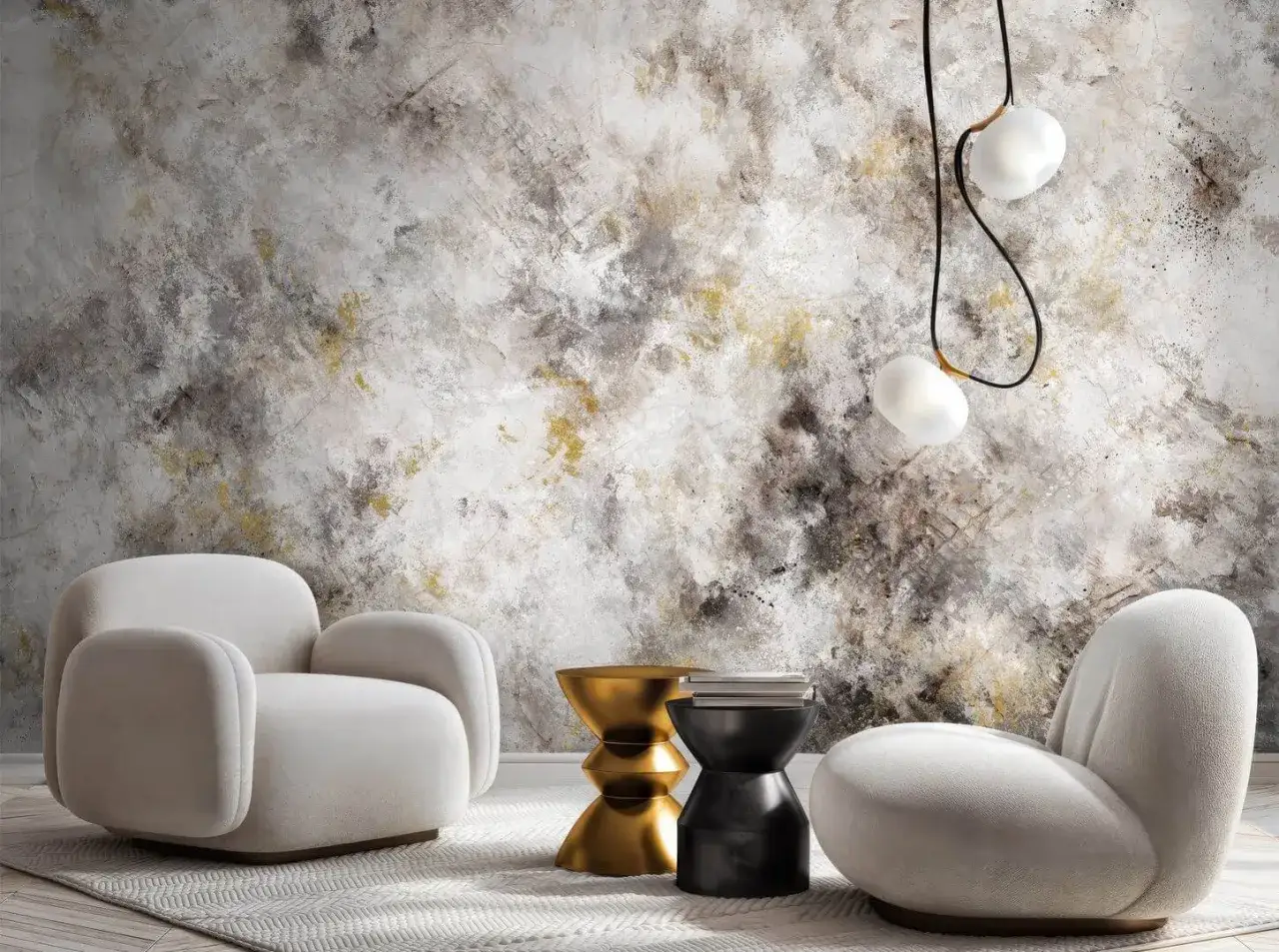 Nowoczesne wnętrze z dwoma białymi fotelami, złotym i czarnym stolikiem, oraz wiszącymi lampami. Tło stanowi efektowna tapeta wypukła o abstrakcyjnym wzorze.