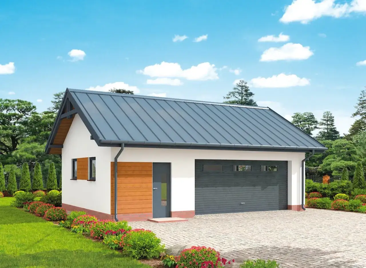 Nowoczesny garaż szkieletowy projekt z szarym dachem i bramą, otoczony zielenią i kwitnącymi krzewami.