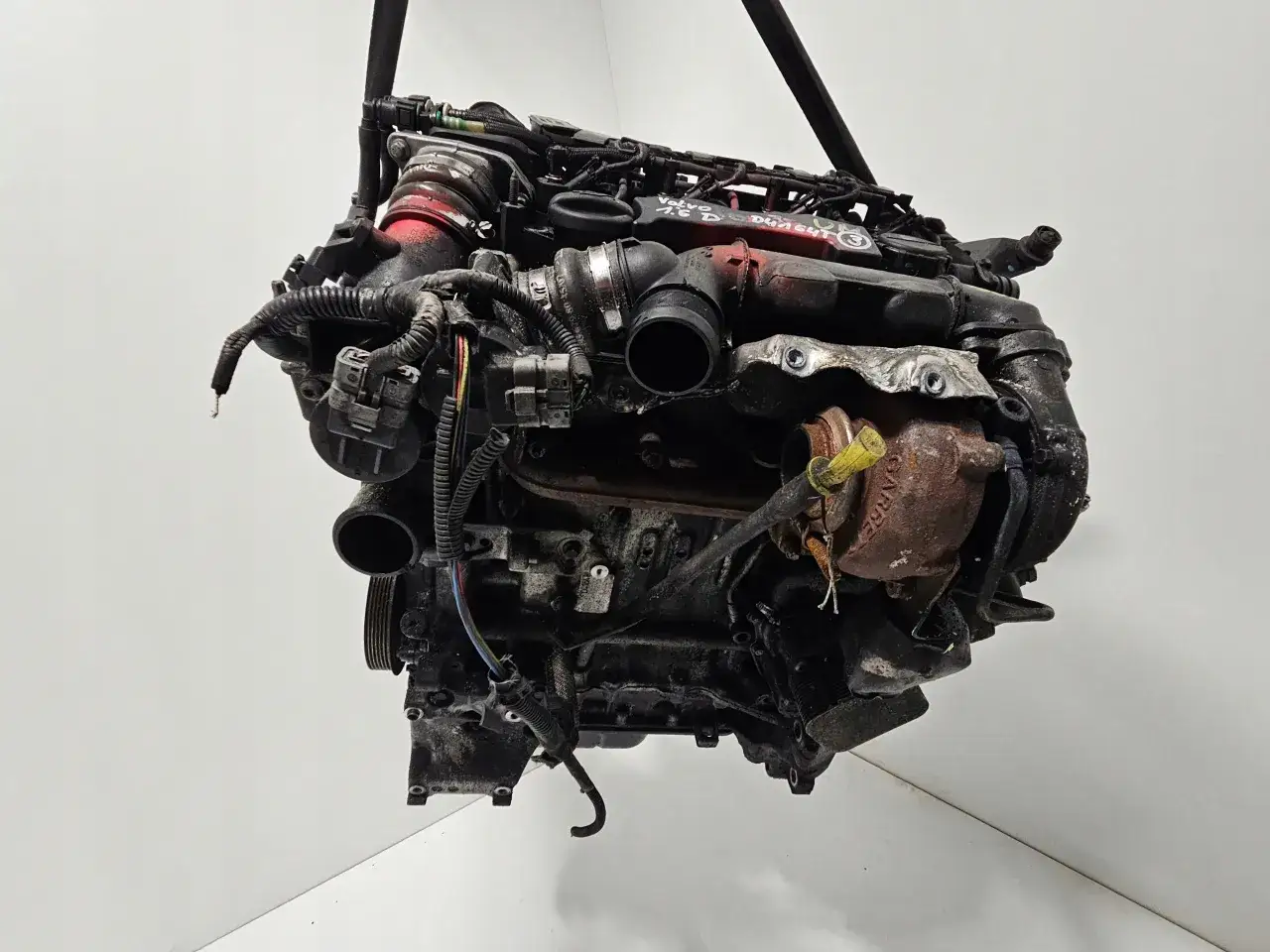 Silnik Volvo 1.6 D, jeden z wielu, które mogą być najlepsze dla Twojego auta. Turbosprężarka Garrett widoczna na zdjęciu.