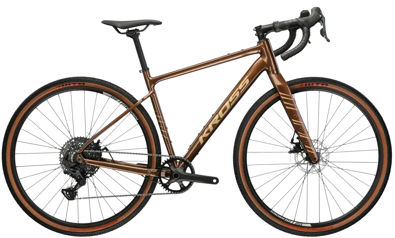 Brązowy rower gravelowy Kross Esker 2.0 Gen 2 z napędem i hamulcami tarczowymi.