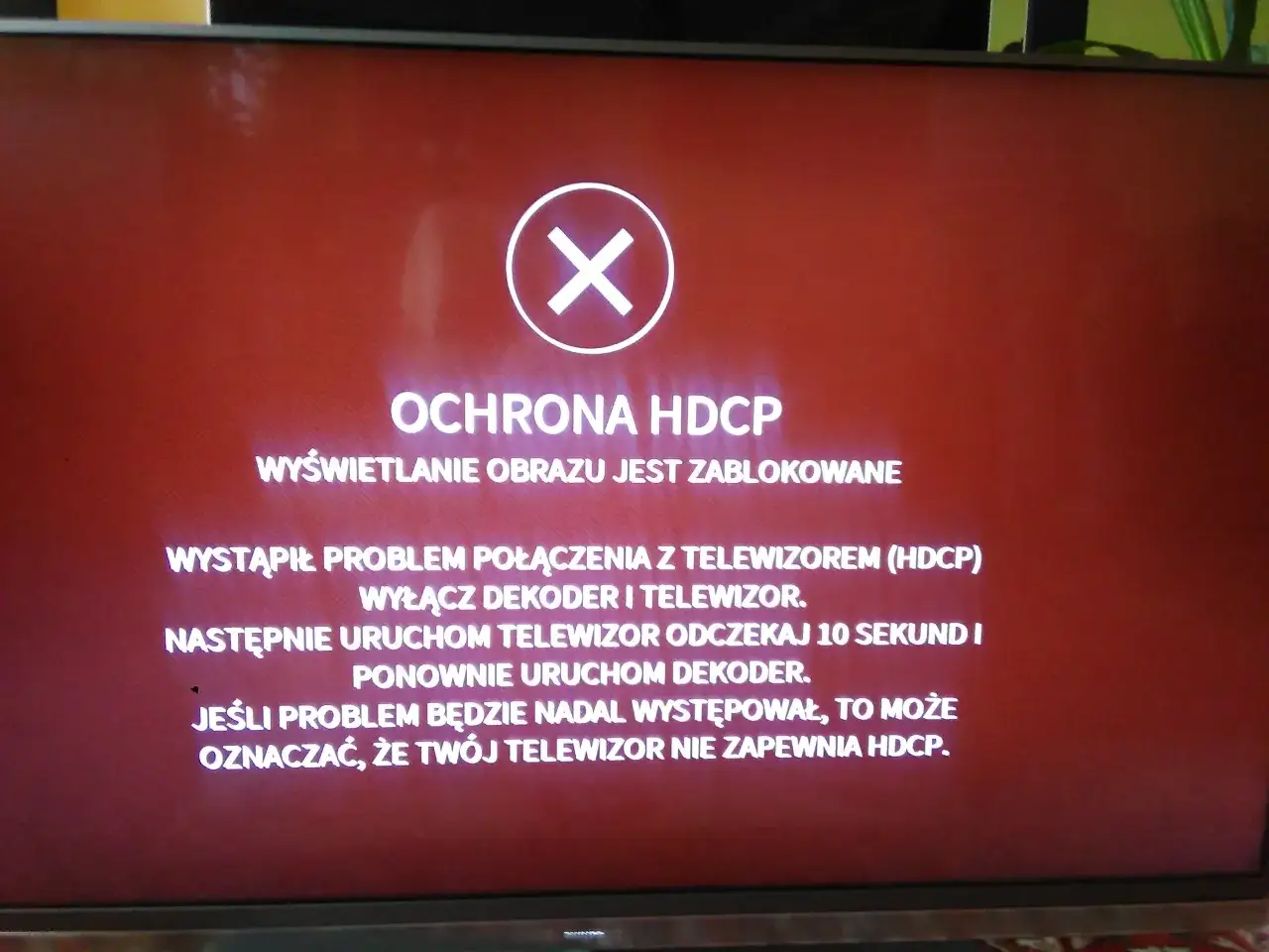 Komunikat o błędzie HDCP na ekranie telewizora z dekoderem Cyfrowego Polsatu. Wyświetlanie obrazu jest zablokowane.