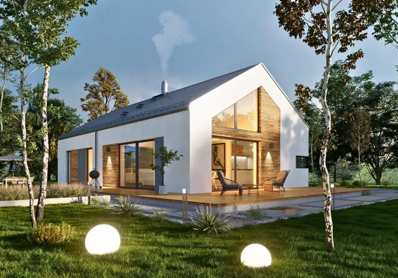 Nowoczesny dom z drewnianymi elementami, przypominający wyglądem stodołę, otoczony zielenią i oświetlony kulistymi lampami.