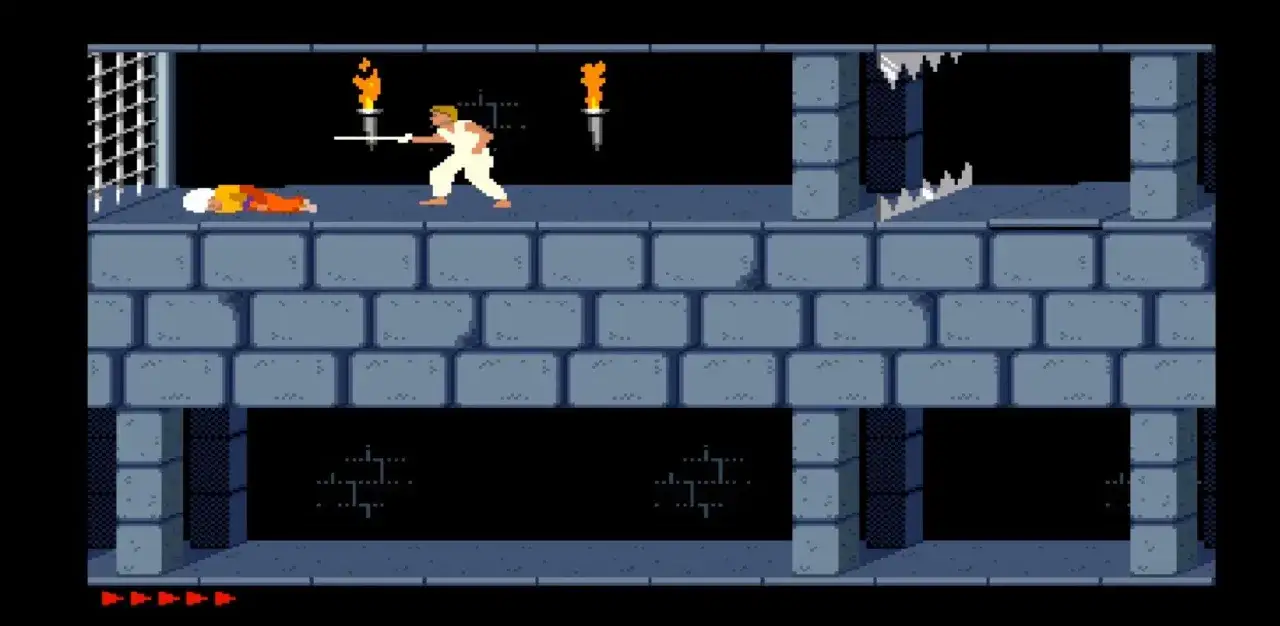 Bohater z mieczem walczy w zamku, jak w **starych grach na PC z lat 90**. Pokonany przeciwnik leży na ziemi.