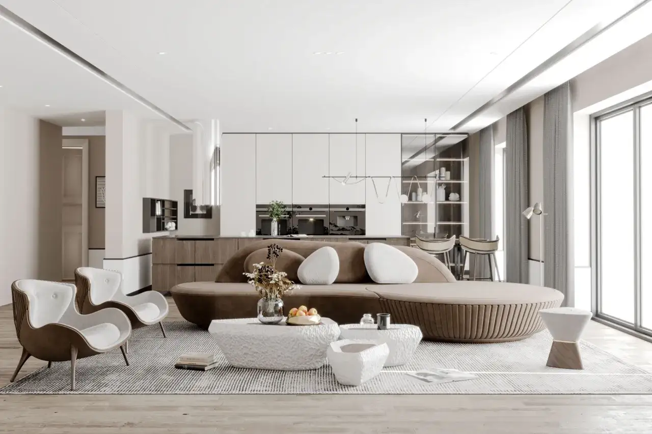 Salon w stylu japandi z zaokrągloną sofą, białymi fotelami i kamiennymi stolikami.