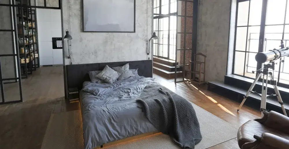 kawalerka wydzielona sypialnia zasłony parawan regał