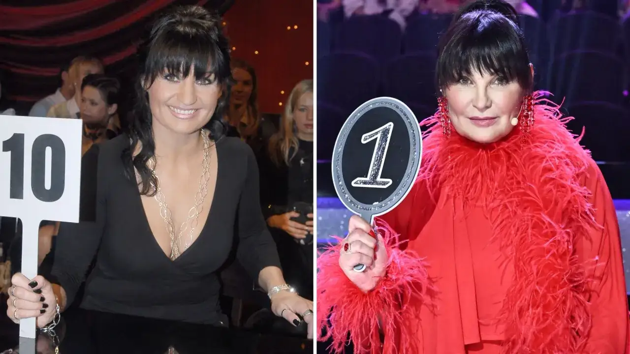 Iwona Pavlović w czarnej sukni z tabliczką 