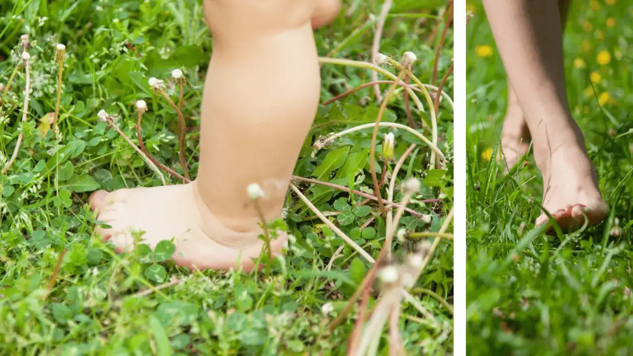 niemowle boso na trawie