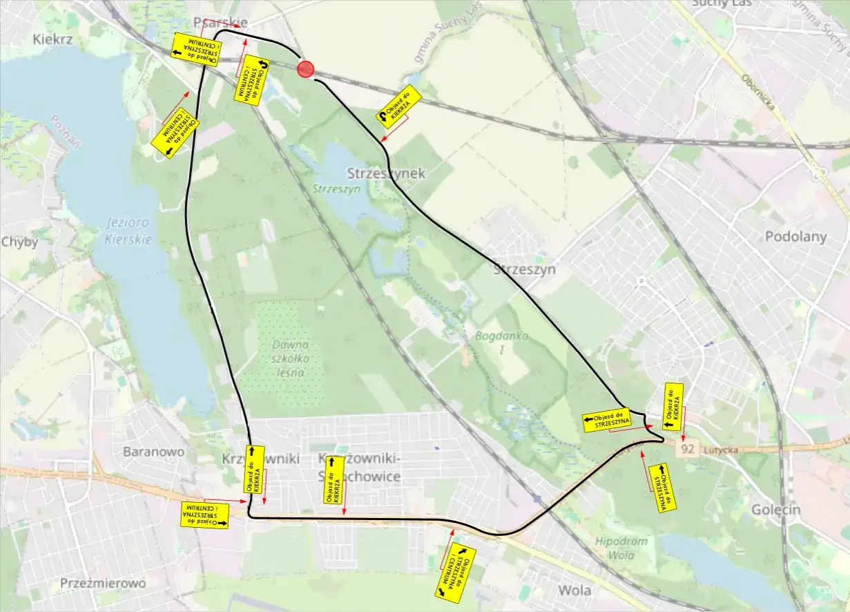 Mapa objazdów w Poznaniu z powodu remontów ulic. Trasa okrąża jezioro Kierskie i tereny leśne.