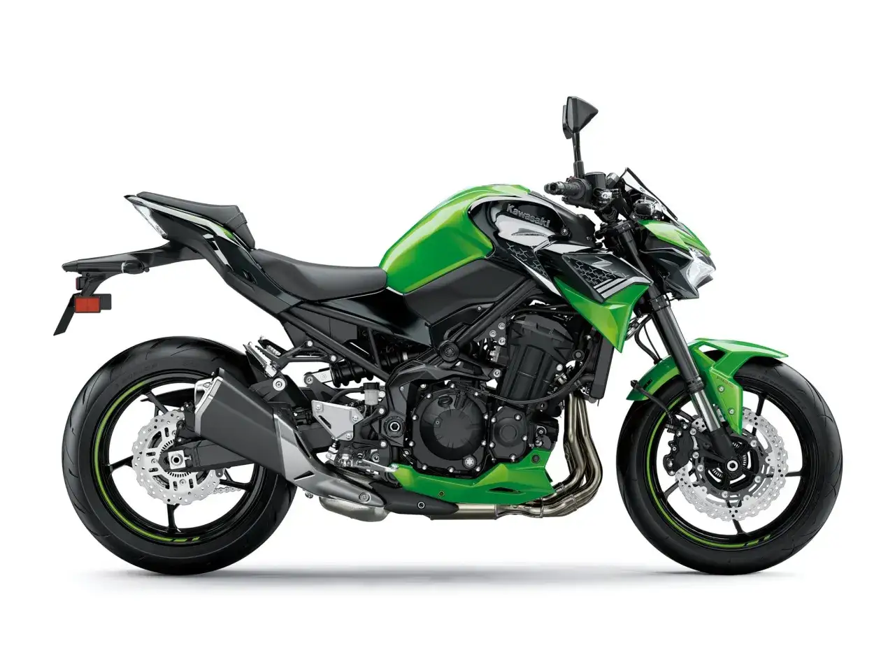 Zielony Kawasaki Z900, zgrabny motocykl sportowy. Sprawdź kawasaki z900 dane techniczne, by poznać jego moc i osiągi.